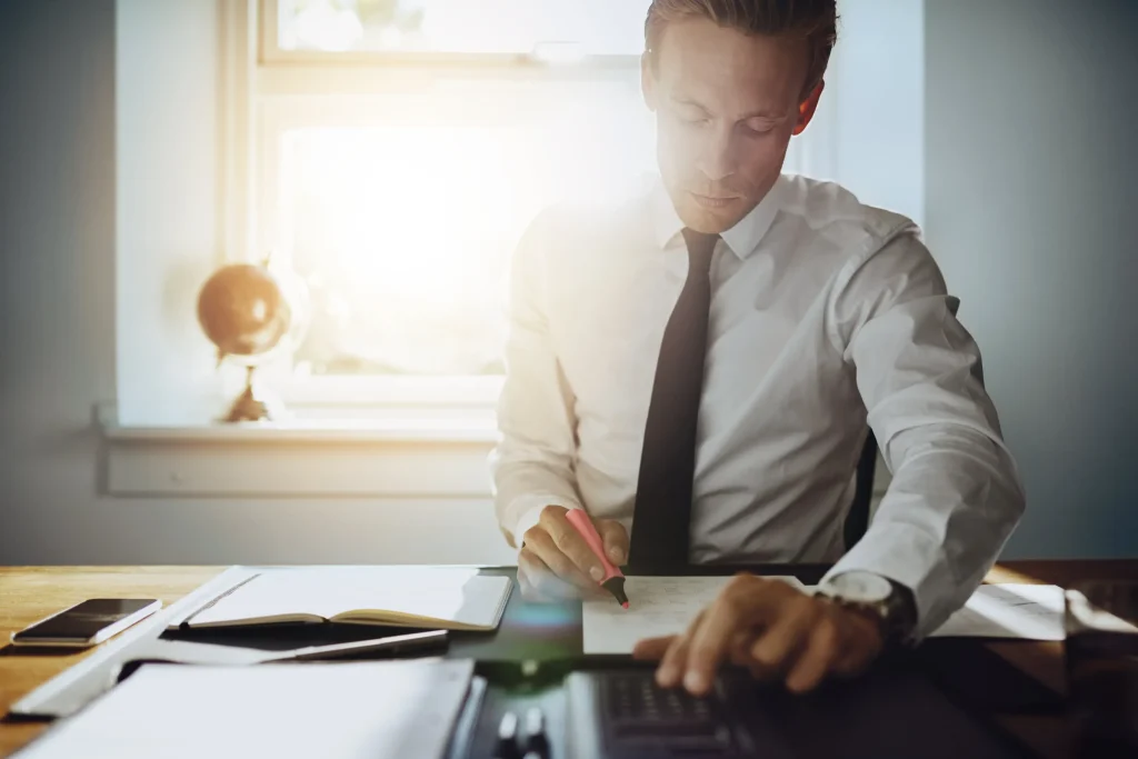 An attorney working at his desk.