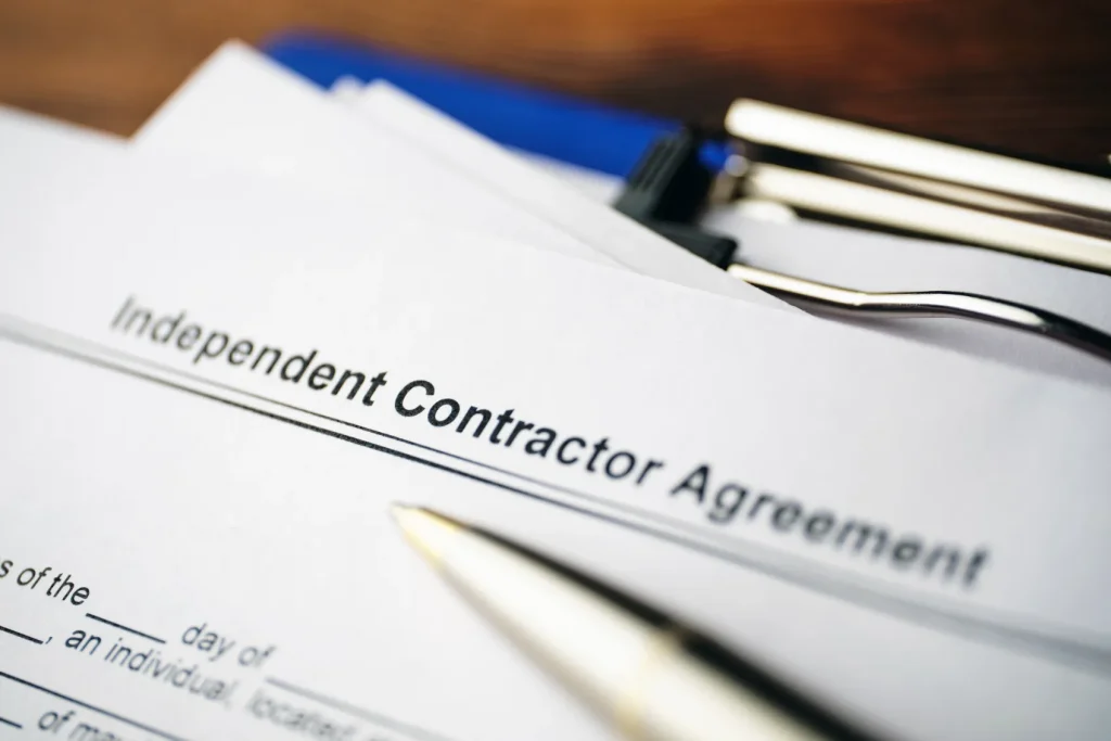 Paperwork that reads Independent Contractor Agreement.
