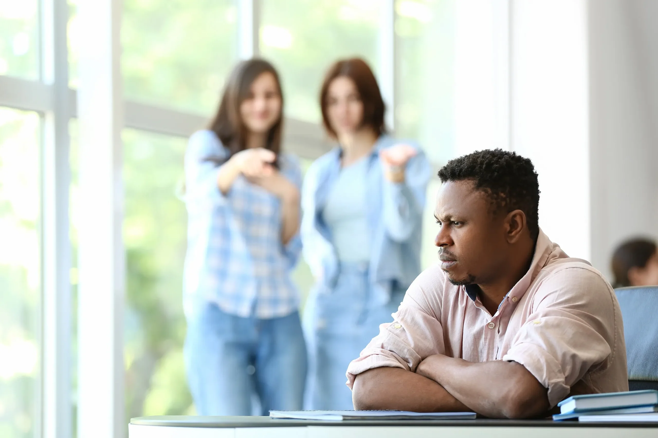 An employee being harassed by coworkers.