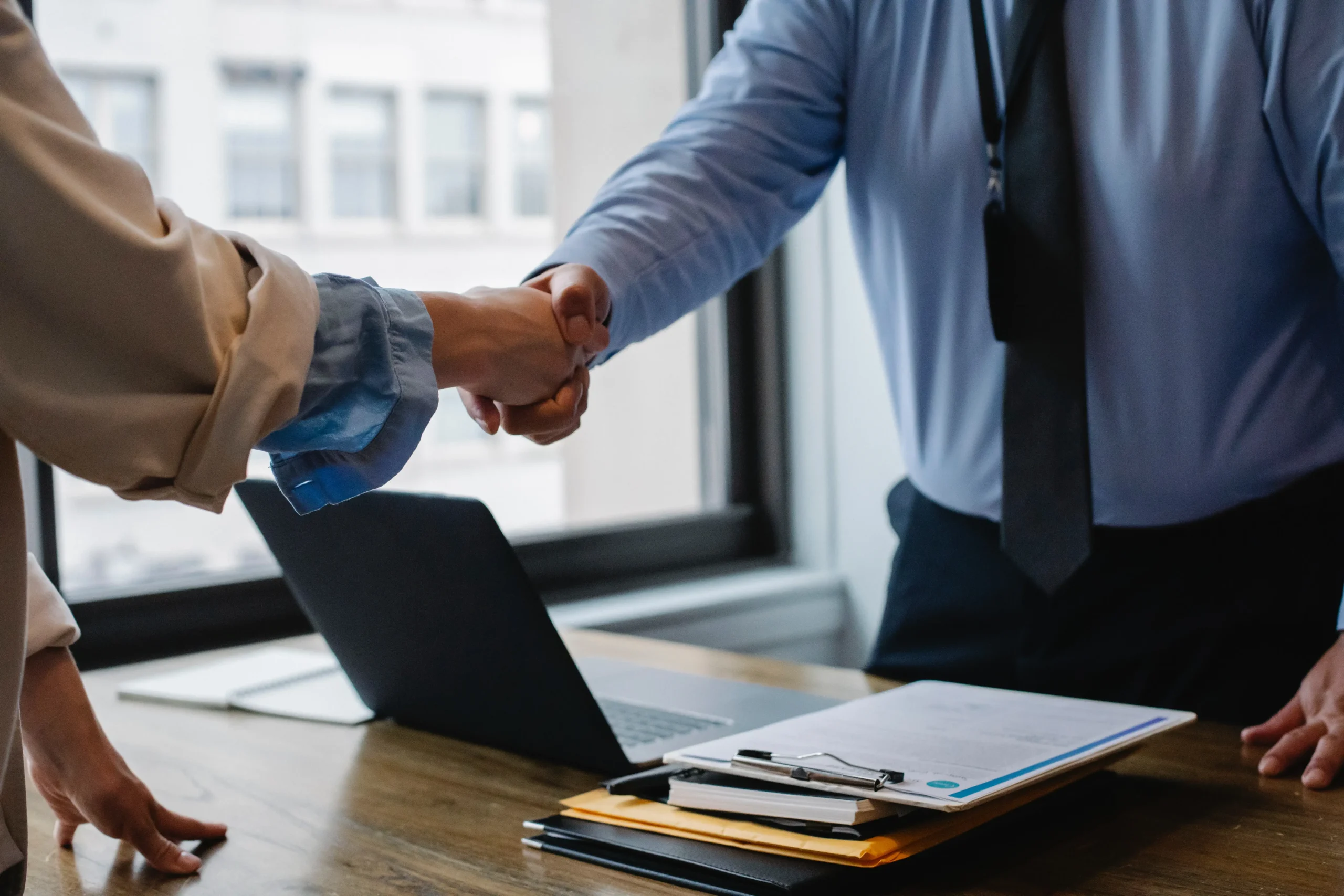 Colleagues shaking hands.