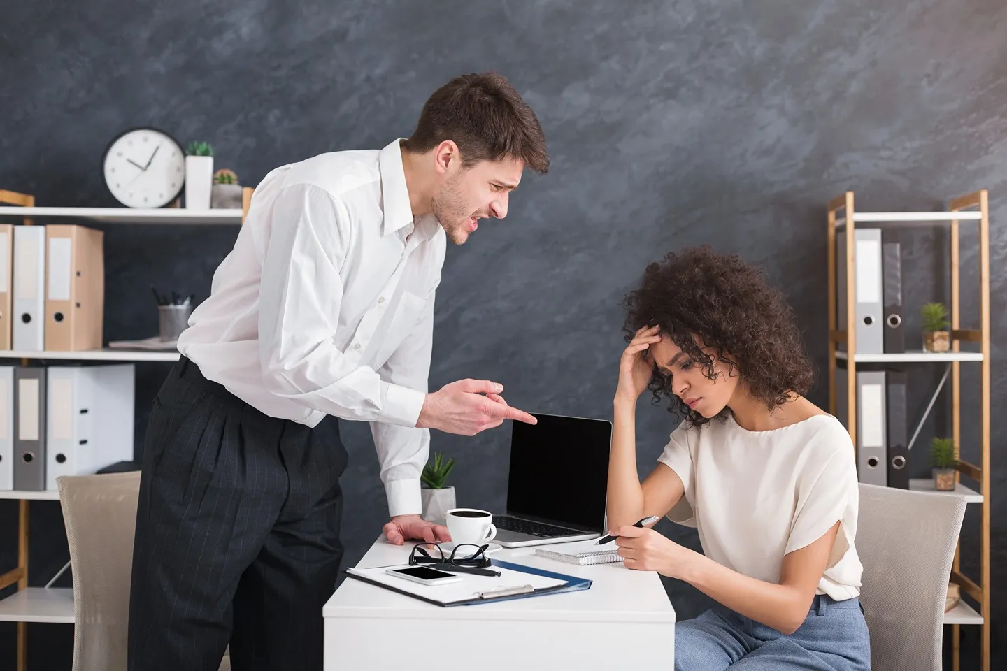 Employer yelling at an employee.