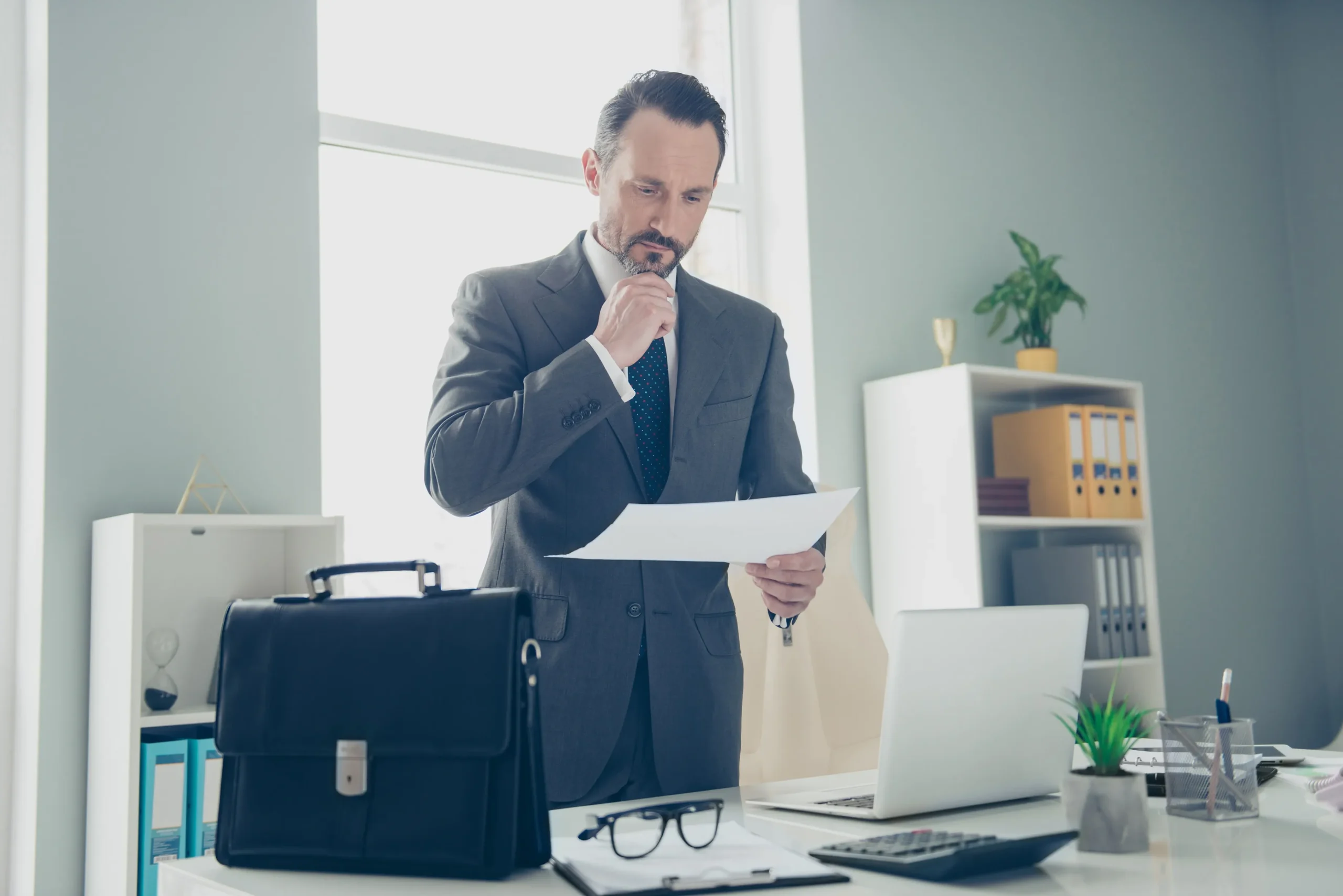 A man reviewing a contract.